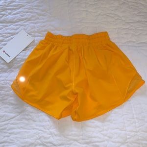 Lululemon neon orange hotty hot shorts